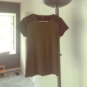 Army green top with leather sleeves