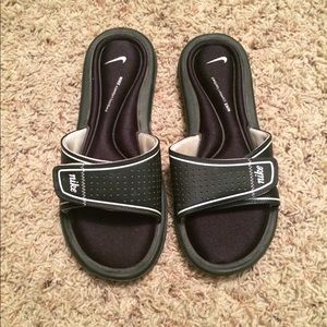 Nike slip on shoes - size 8.