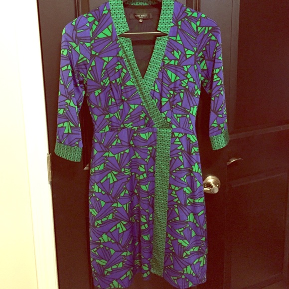 Funky pattern, flattering fit! Great wrap dress