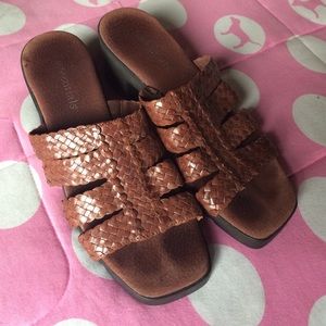 Brown lifted sandals