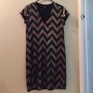 Black and gold sequence dress