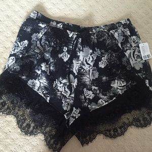 Flowy black lace shorts