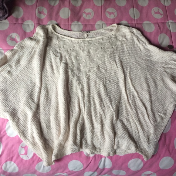 Slouchy beige sweater by Ecote.