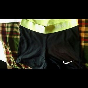 Neon yellow nike compression shorts