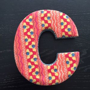 Decorative letter "C"
