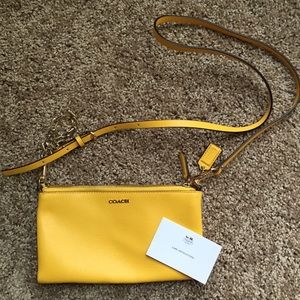 Small yellow Coach cross body