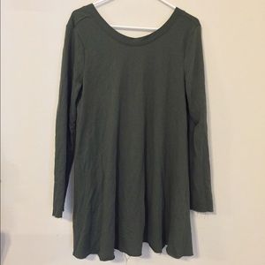 green long-sleeved dress with lower back neckline