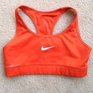 Orange Nike dri fit sports bra