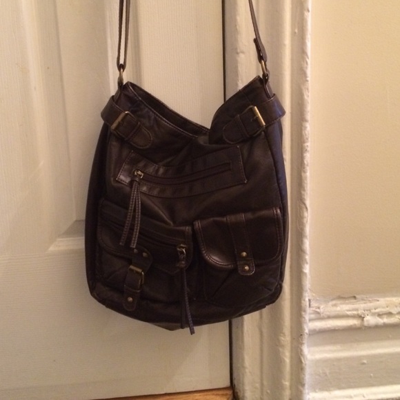 I am selling the most cutest brown cross body bag