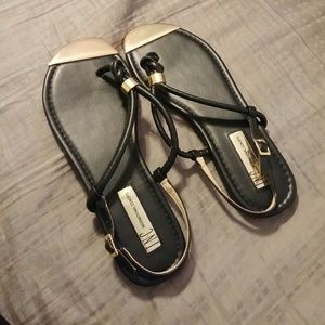 Black and gold sandals