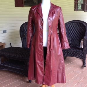 Long leather coat gently used. Color is Burgundy.