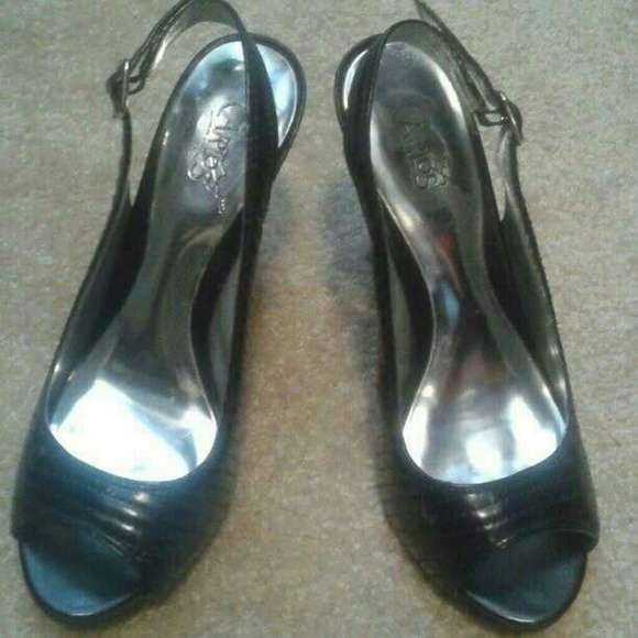 Carlos Santana heels
