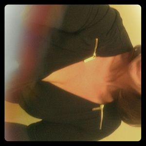 Micheal Kors black cross wrap front . Gold zippers