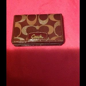 Burgundy coach wallet