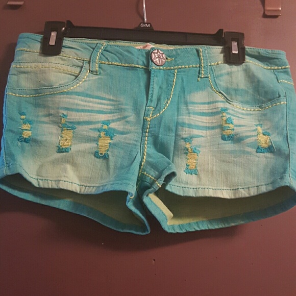 Green fade way distressed stretch Jean shorts