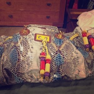 New handbag. Nice large size. Cute details