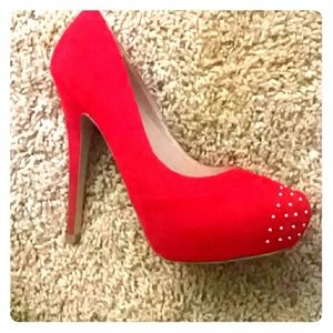 Every girl needs a pair of Red high heels!!