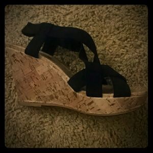Black high wedge shoes
