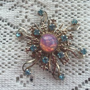 Costume foil back faux opal blue rhinestone pin