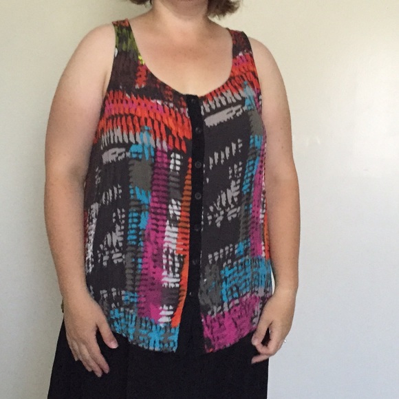 Sleeveless, button down blouse, bright and bold