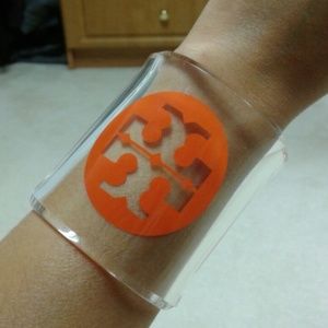 Tory Burch orange logo lucite cuff bracelet