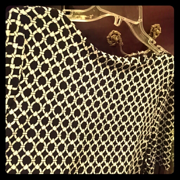 Neat design top...can wear spring fall Summer