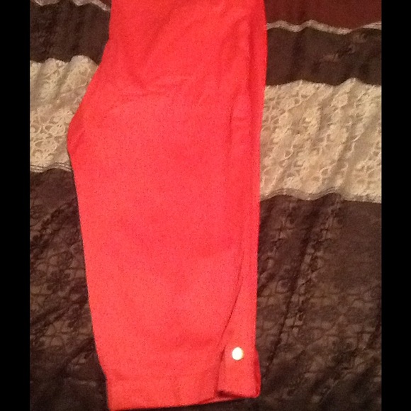Coral capris with gold color buttons