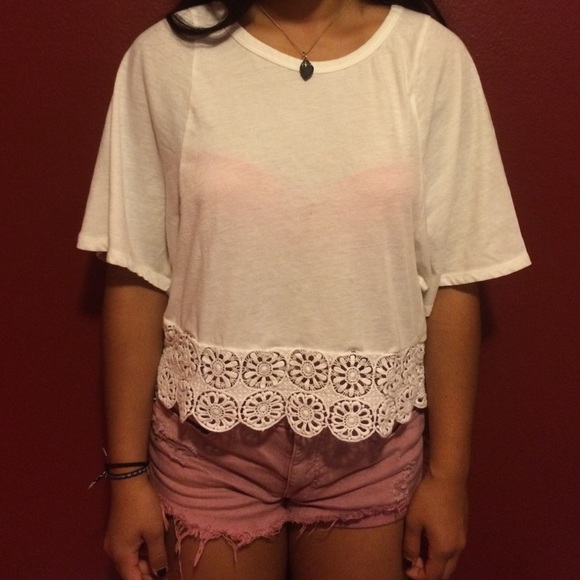 Zara white shirt falls right above waist