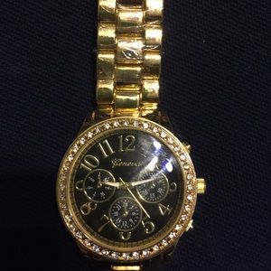 Geneva. Gold link watch.  Stainless steal