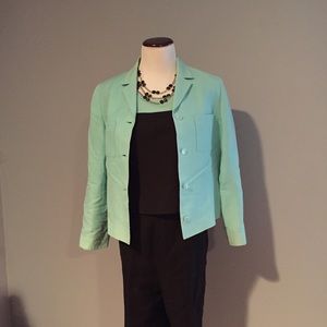 Kasper suit. Color is light blue