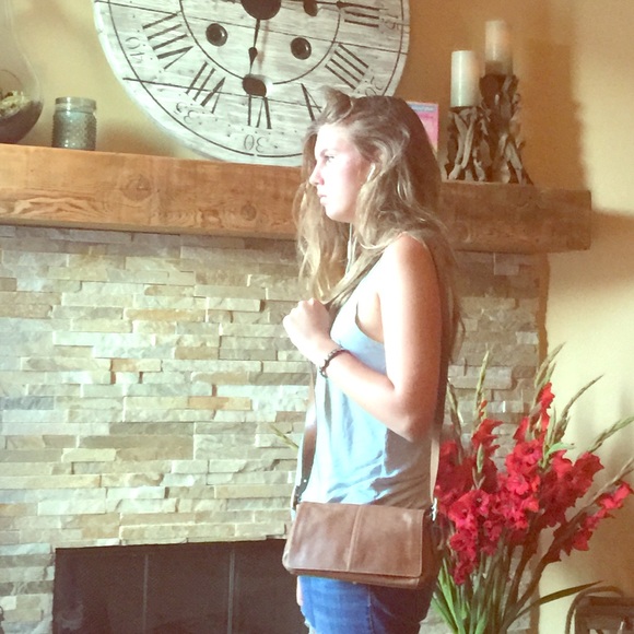 Authentic coach purse in camel tan leather.