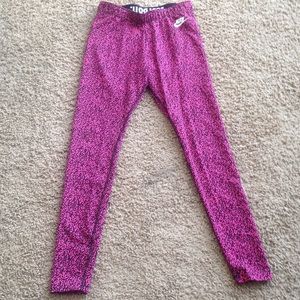 Pink and black Nike leggings
