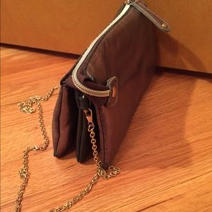 Gold and black crossbody with 3 compartments