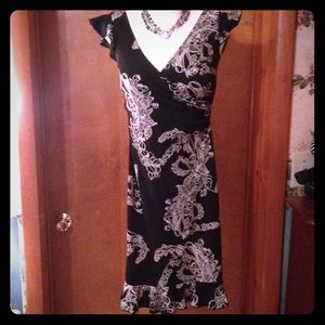 Black and cream print dress.