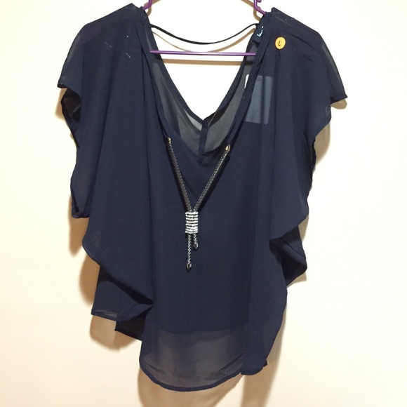 NWT batwing top with statement piece