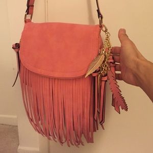 Beautiful coral hobo bag with tassels. Brand new.