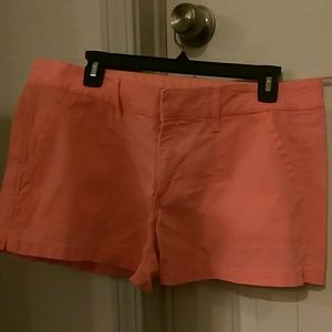 Light coral pink denim shorts