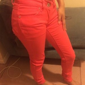 Red / orange skinny jeans