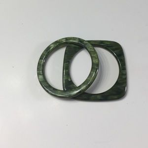 Green plastic circle and square bracelets