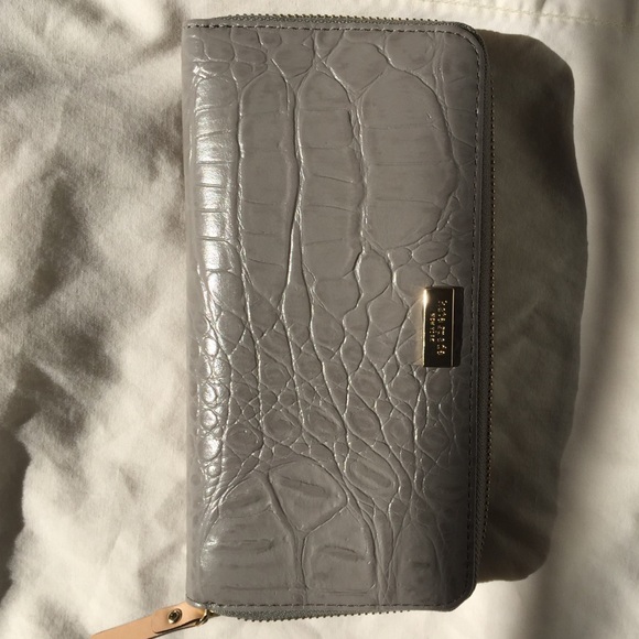 Kate Spade zip wallet, new, never used.