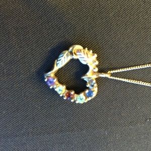 Black hills gold 18" heart necklace with5 stones.