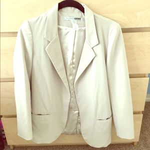 Beige blazer.