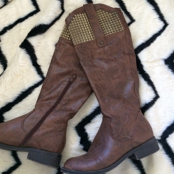 Tall brown leather boots