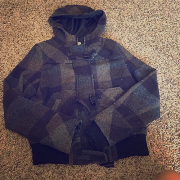 dark colored plaid winter jacket