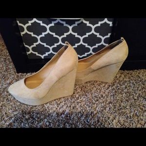 Tan suede material wedges. Worn once.