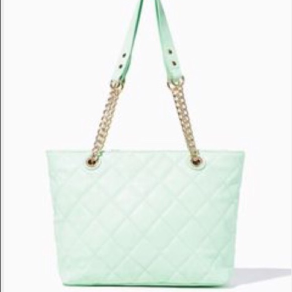 A cute mint charming Charlie's handbag