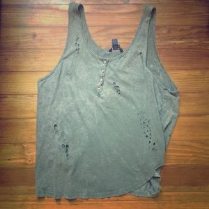Acid wash destroyed oversized olive tank