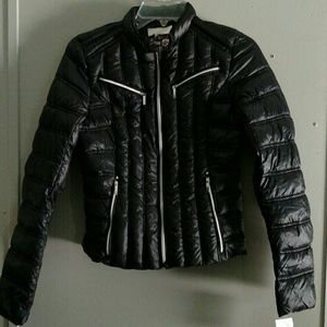 Black Jacket with Laundry bag.