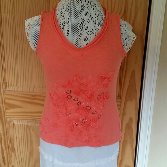 Top with floral embellishment