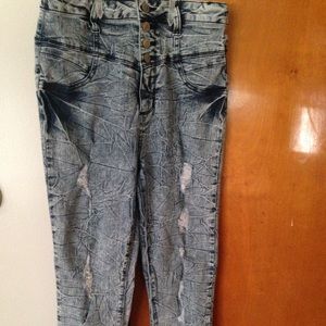 High waisted bleached jeans .